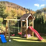 Alpejka - W Gorach بيت خشبي